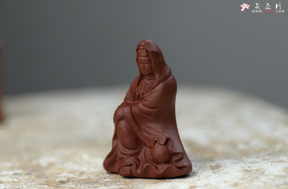 紫砂壶图片：慈悲祥和 坐观音 - 宜兴紫砂壶网