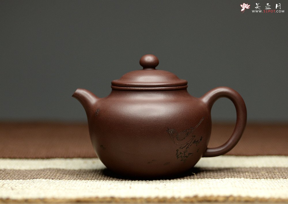 紫砂壶图片：此壶造型饱满 线条流畅 做工精美 掇只 - 宜兴紫砂壶网