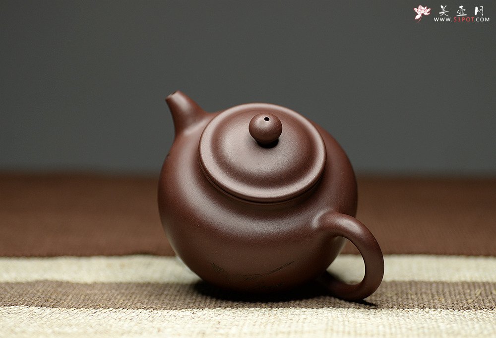 紫砂壶图片：此壶造型饱满 线条流畅 做工精美 掇只 - 宜兴紫砂壶网