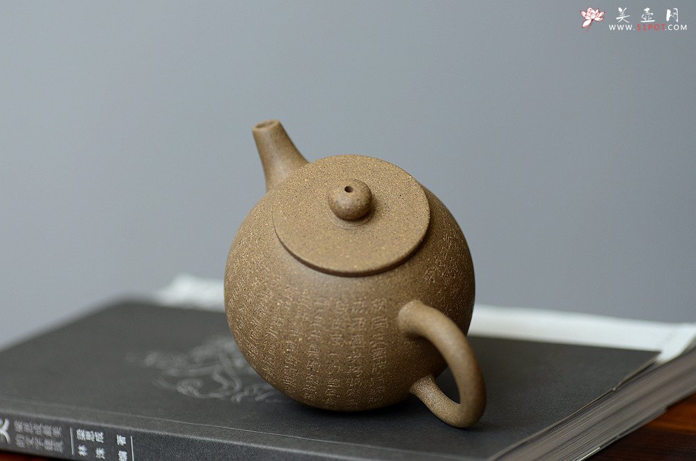 紫砂壶图片：美壶特惠 心经小巨轮  杀茶利器 茶人最爱 - 宜兴紫砂壶网