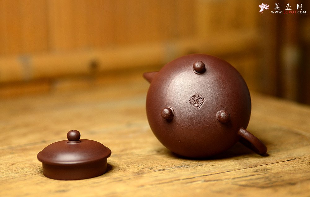 紫砂壶图片：美壶特惠 谭华斌精致作品 三足水平 圆润饱满 俊秀可爱 - 宜兴紫砂壶网