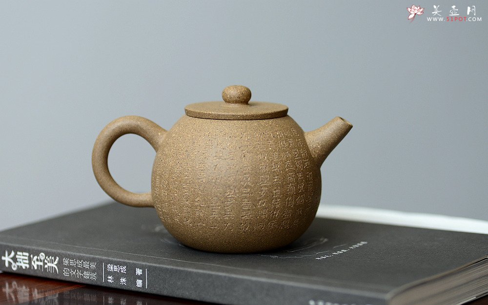 紫砂壶图片：美壶特惠 心经小巨轮  杀茶利器 茶人最爱 - 宜兴紫砂壶网