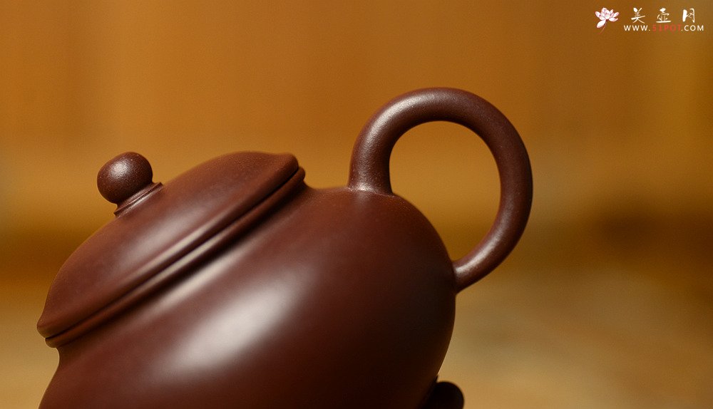 紫砂壶图片：美壶特惠 谭华斌精致作品 三足水平 圆润饱满 俊秀可爱 - 宜兴紫砂壶网