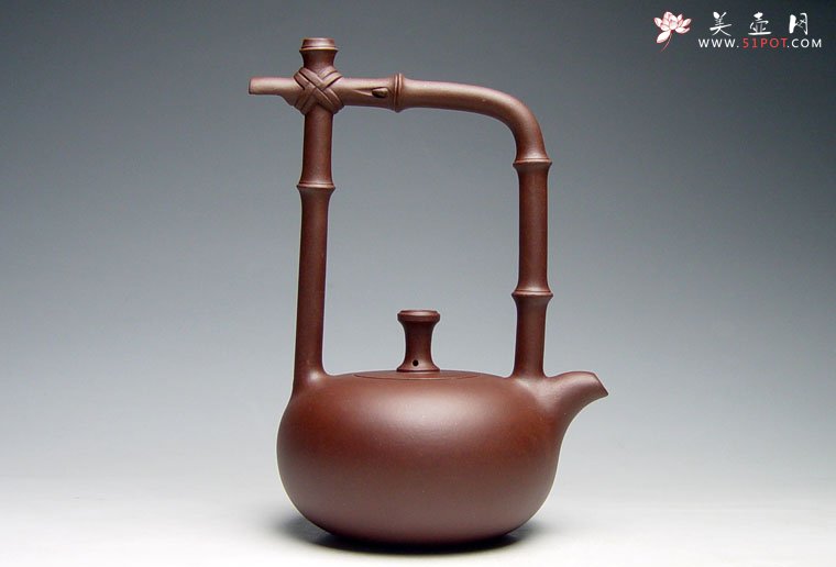 紫砂壶图片：美林提梁壶 - 宜兴紫砂壶网
