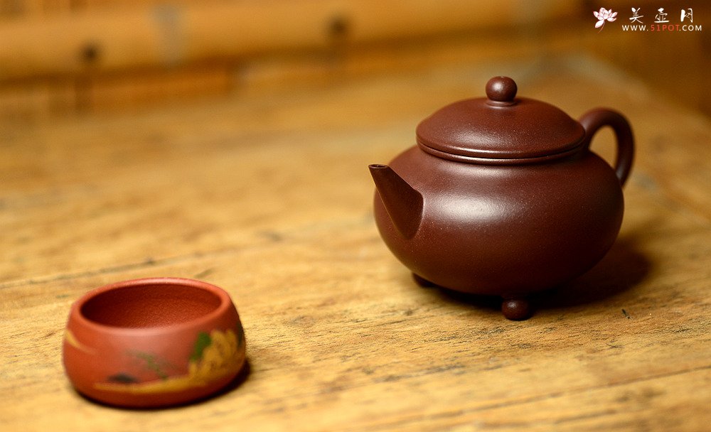 紫砂壶图片：美壶特惠 谭华斌精致作品 三足水平 圆润饱满 俊秀可爱 - 宜兴紫砂壶网