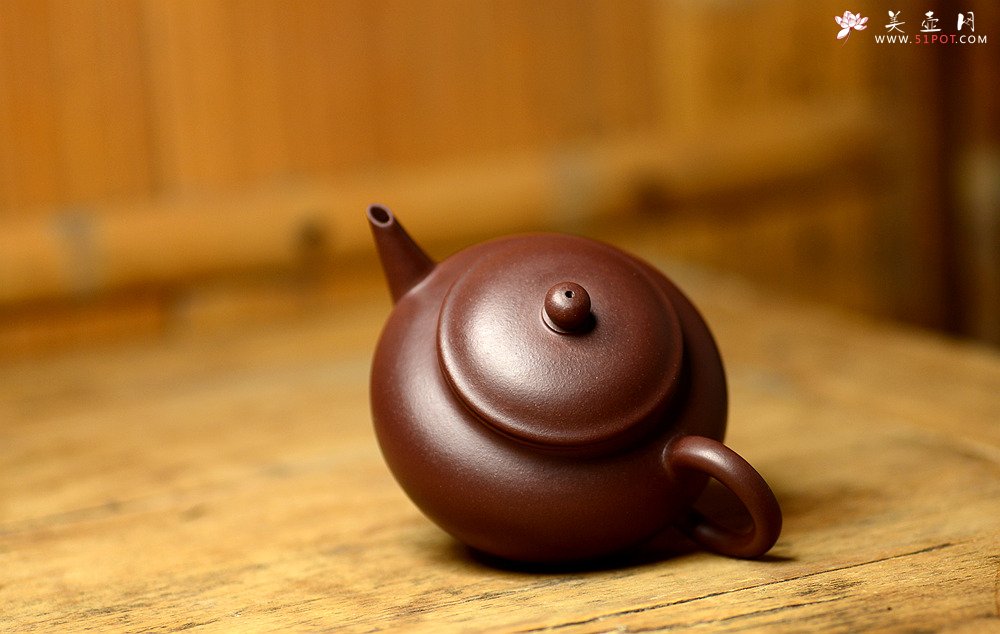 紫砂壶图片：美壶特惠 谭华斌精致作品 三足水平 圆润饱满 俊秀可爱 - 宜兴紫砂壶网