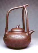 紫砂壶图片：滔滔提梁壶 - 宜兴紫砂壶网