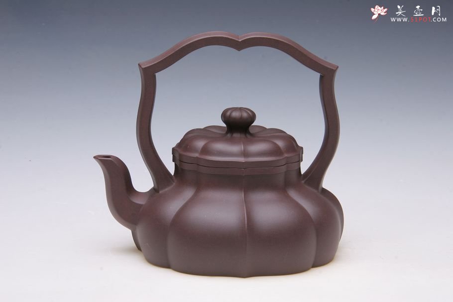 紫砂壶图片：提梁菱花壶 - 宜兴紫砂壶网