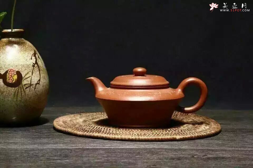 紫砂壶图片：虚扁 - 宜兴紫砂壶网