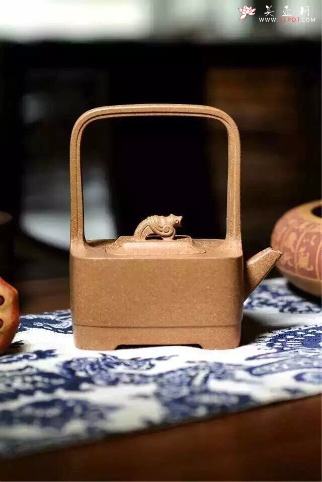 紫砂壶图片：提梁壶 - 宜兴紫砂壶网