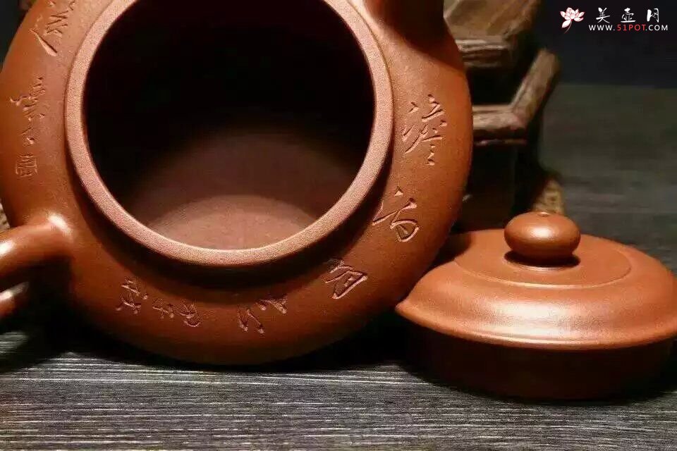 紫砂壶图片：虚扁 - 宜兴紫砂壶网