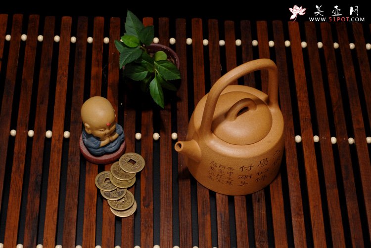 紫砂壶图片：曼生提梁 - 宜兴紫砂壶网