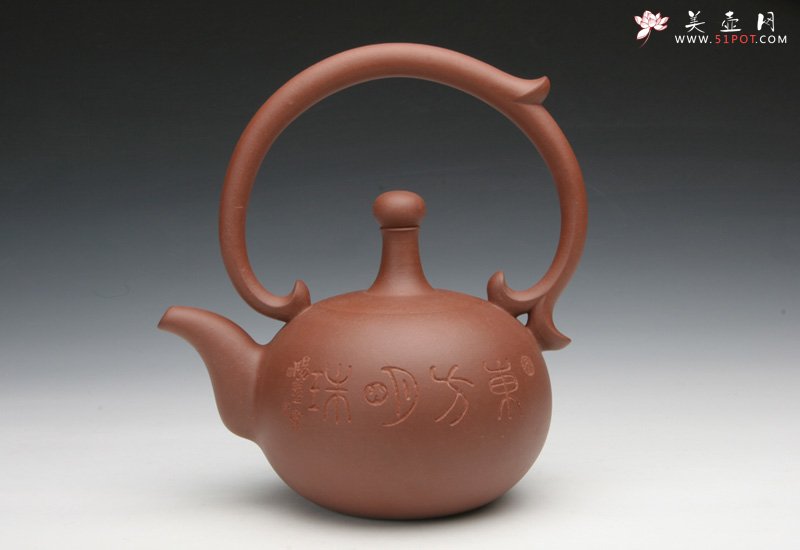紫砂壶图片：原创东方明珠提梁壶 - 宜兴紫砂壶网