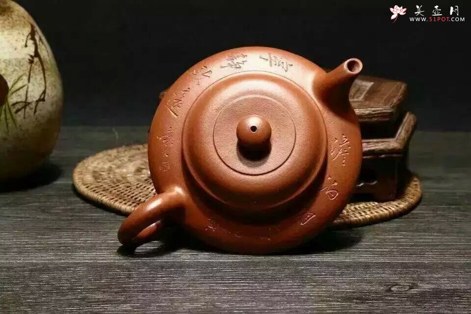 紫砂壶图片：虚扁 - 宜兴紫砂壶网