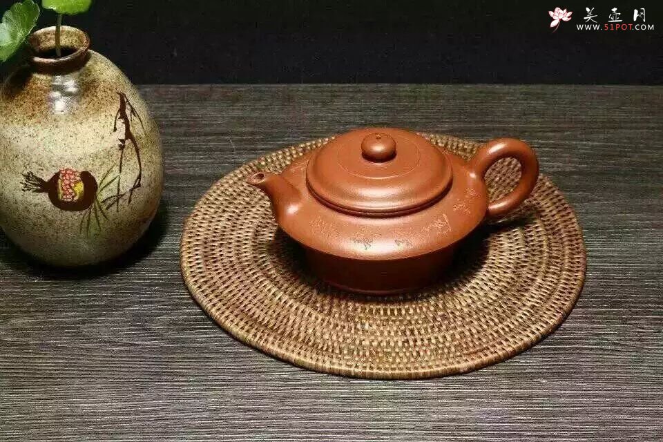 紫砂壶图片：虚扁 - 宜兴紫砂壶网