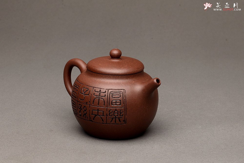 紫砂壶图片：端庄秀雅 双刀禅意装饰 全手和悦 适宜普洱、红茶 - 宜兴紫砂壶网