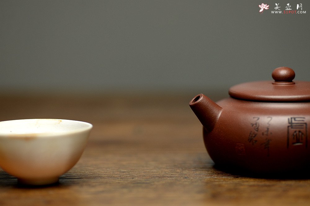紫砂壶图片：实用佳器 秀气可爱 扁拙 - 宜兴紫砂壶网