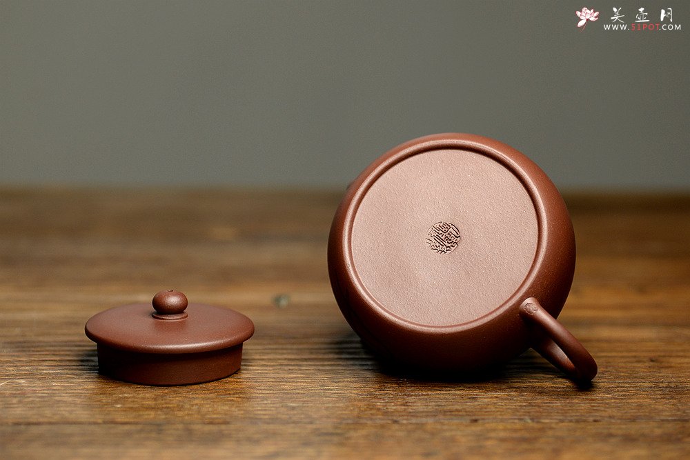 紫砂壶图片：实用佳器 秀气可爱 扁拙 - 宜兴紫砂壶网