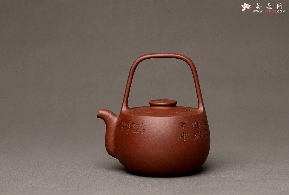 紫砂壶图片：钱建荷全手新作 福乐提梁 做工精致 国助袁德波装饰 - 宜兴紫砂壶网