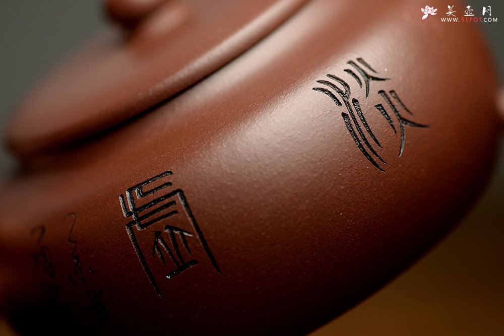 紫砂壶图片：实用佳器 秀气可爱 扁拙 - 宜兴紫砂壶网