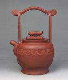 紫砂壶图片：檀琮提梁 - 宜兴紫砂壶网