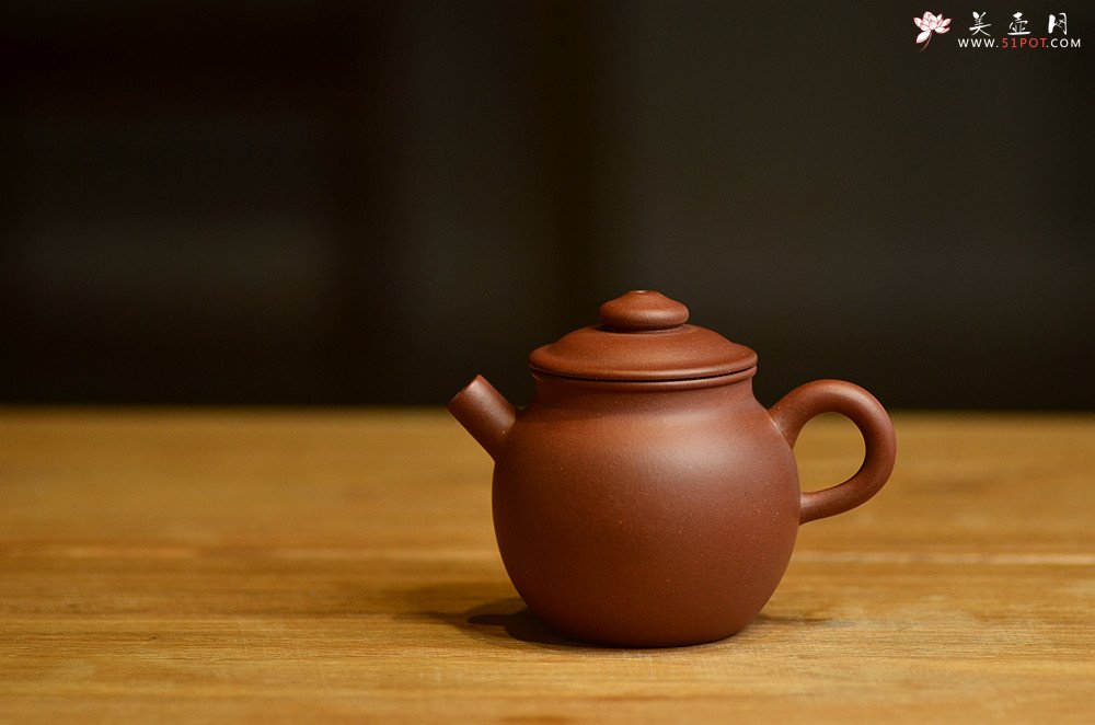 紫砂壶图片：美壶特惠 玩味巨轮 茶人最爱 实用 独孔加不锈钢滤网 - 宜兴紫砂壶网