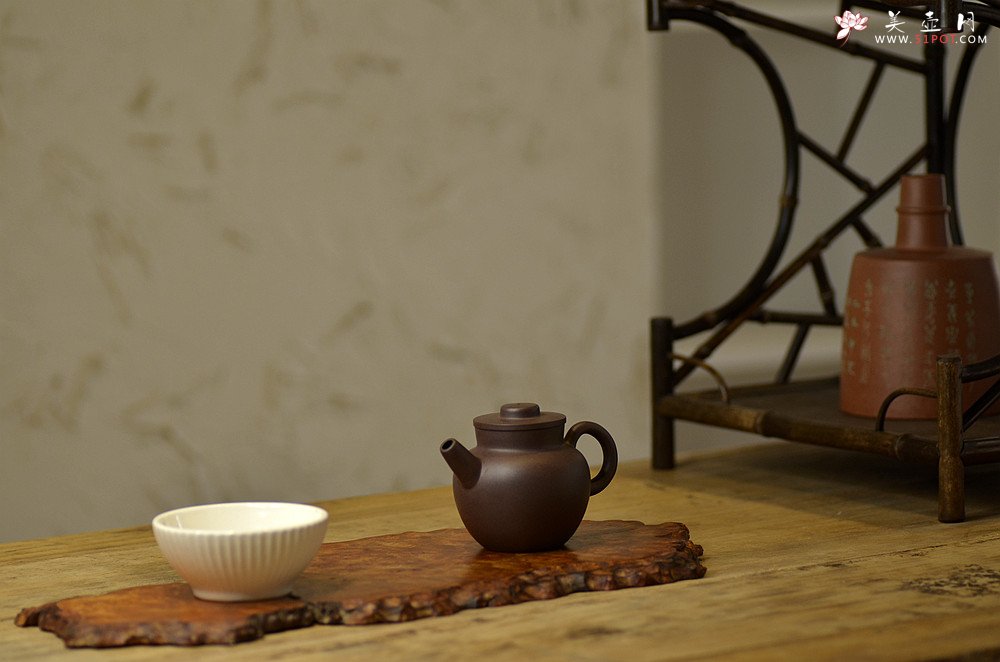 紫砂壶图片：美壶特惠 茶人最爱 杀茶利器 古朴小品 实用巨轮 - 宜兴紫砂壶网