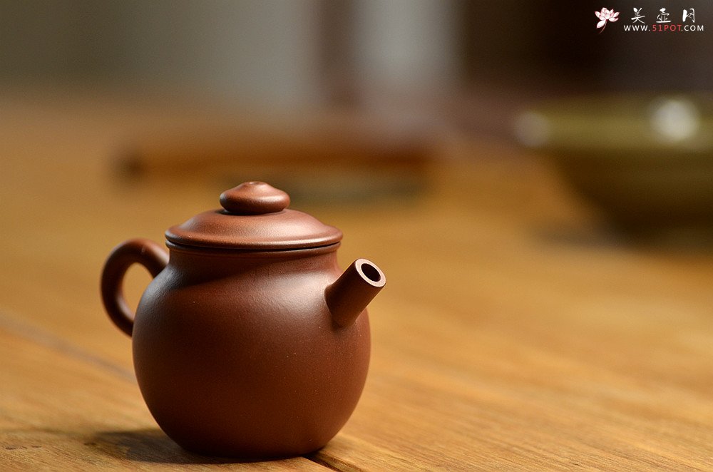 紫砂壶图片：美壶特惠 玩味巨轮 茶人最爱 实用 独孔加不锈钢滤网 - 宜兴紫砂壶网