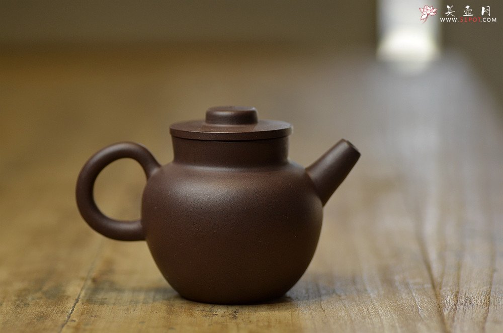 紫砂壶图片：美壶特惠 茶人最爱 杀茶利器 古朴小品 实用巨轮 - 宜兴紫砂壶网