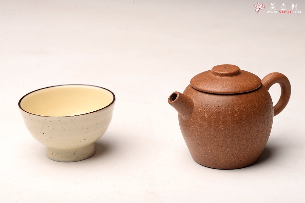 紫砂壶图片：摹古心经巨轮 古朴耐品 实用传神 古拙小炮 - 宜兴紫砂壶网