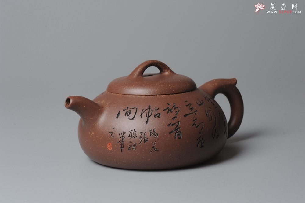 紫砂壶图片：文气装饰 饱满敦厚 扁腹 - 宜兴紫砂壶网