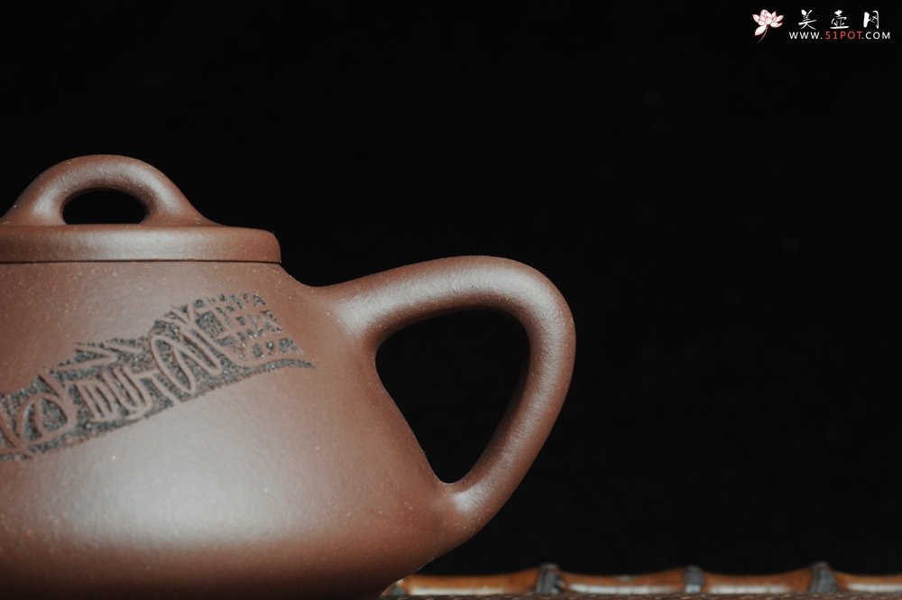 紫砂壶图片：全手工摹古子冶石瓢 骨肉匀挺 桑宝安高徒孙嘉宜文气装饰 静以修身 俭以养德 - 宜兴紫砂壶网