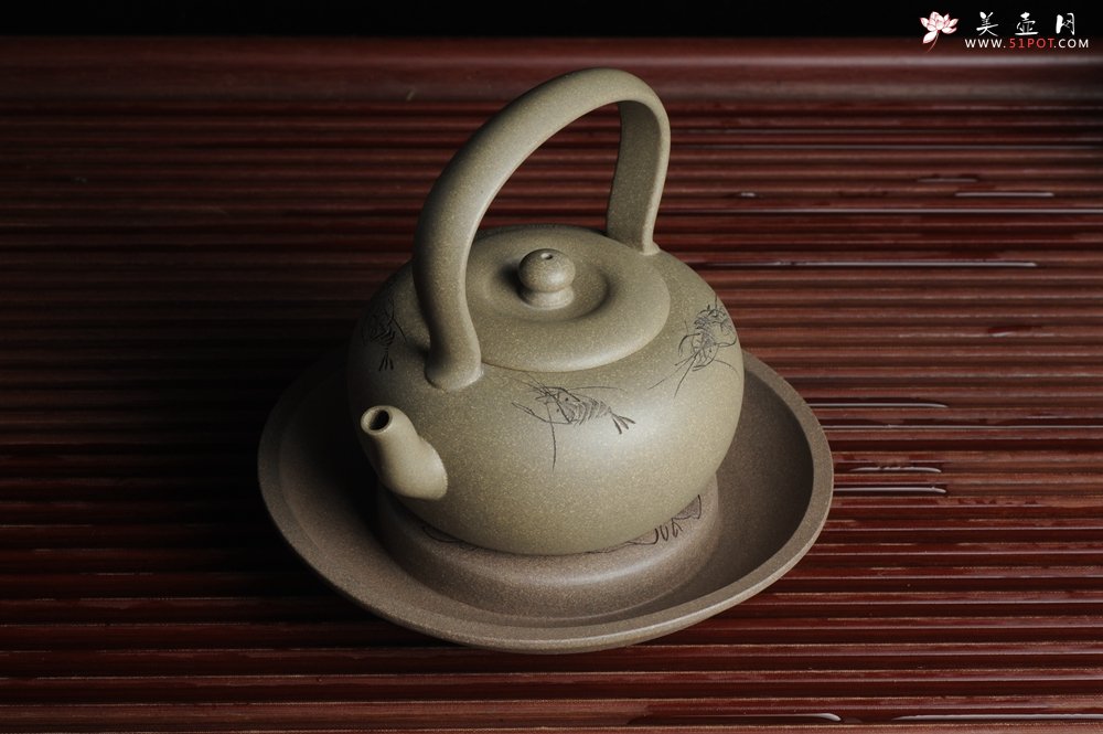 紫砂壶图片：美器特惠 助工精工老青段壶承 干泡台 布袋弥勒 神态细腻 外径大约14.3cm - 宜兴紫砂壶网