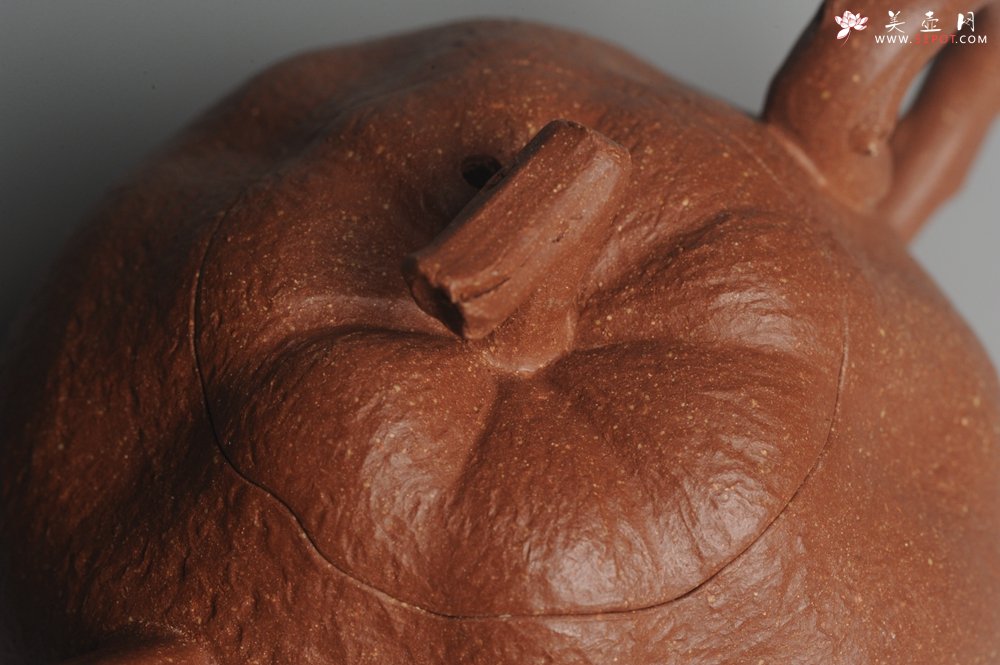 紫砂壶图片：美壶特惠 油润降坡泥精致卡盖全手工仿生丑橘壶 - 宜兴紫砂壶网