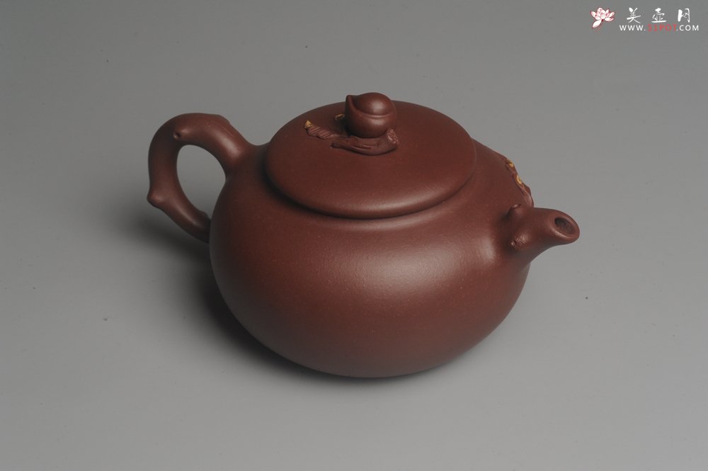 紫砂壶图片：美壶福利特惠 精致做工 寿桃壶 茶人醉爱 - 宜兴紫砂壶网