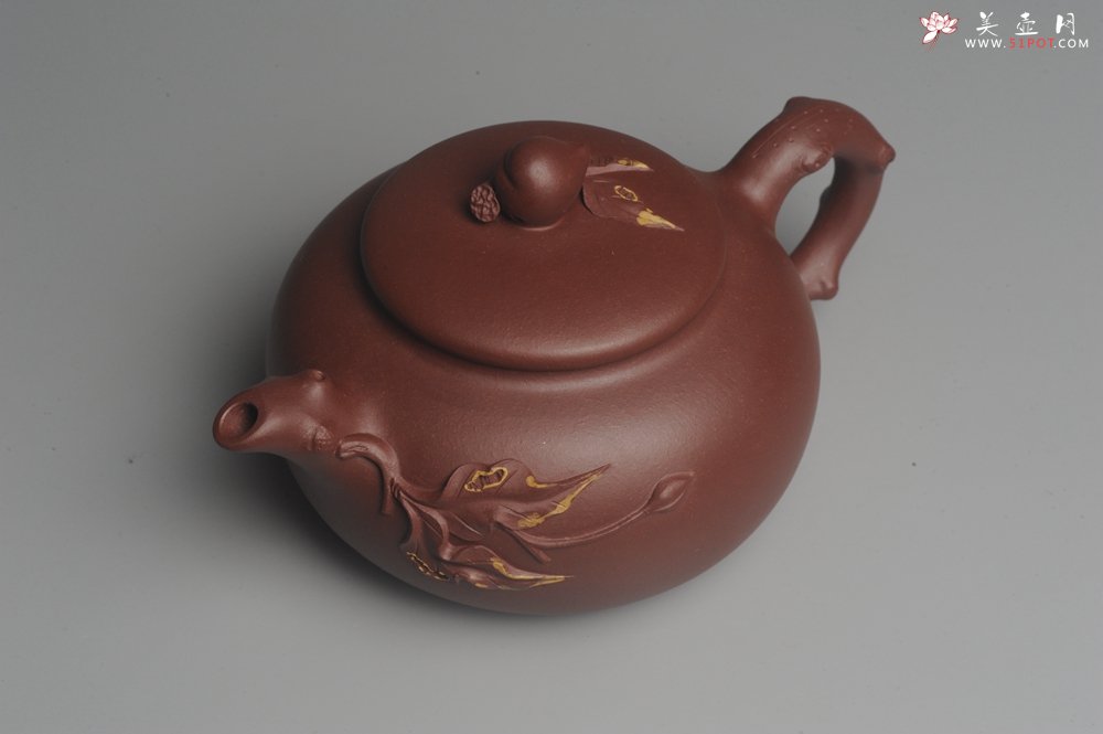 紫砂壶图片：美壶福利特惠 精致做工 寿桃壶 茶人醉爱 - 宜兴紫砂壶网