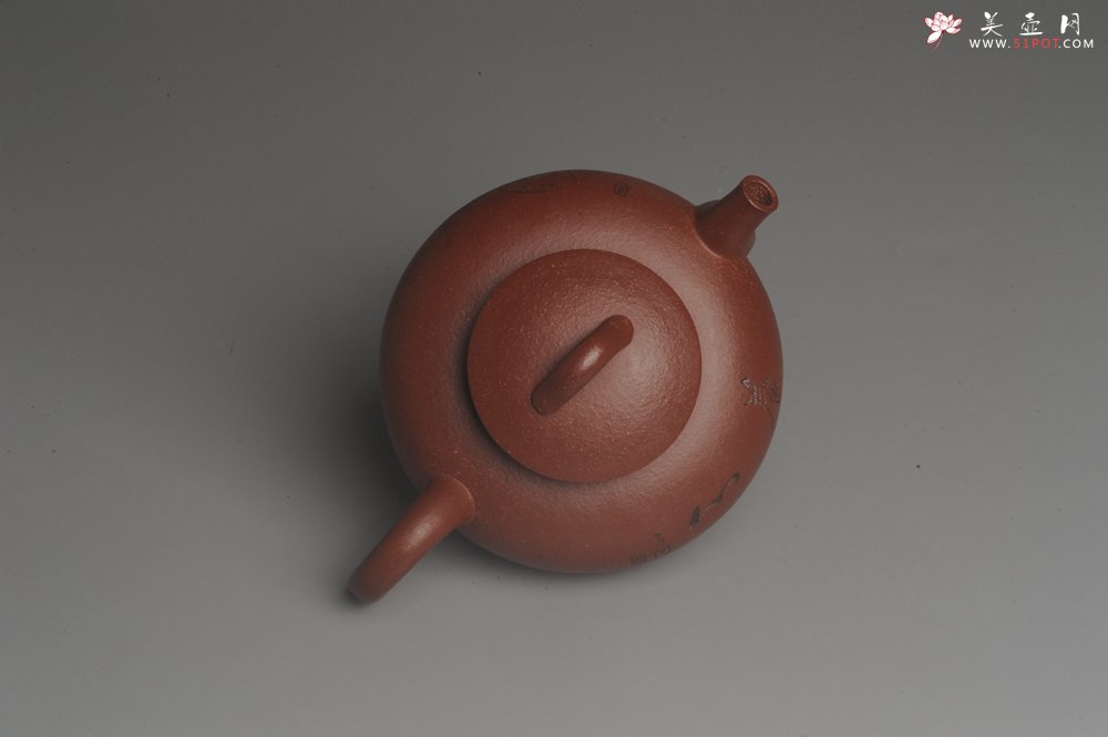 紫砂壶图片：美壶特惠 助工精工降坡泥陶瓮壶 蜗牛特文气 - 宜兴紫砂壶网
