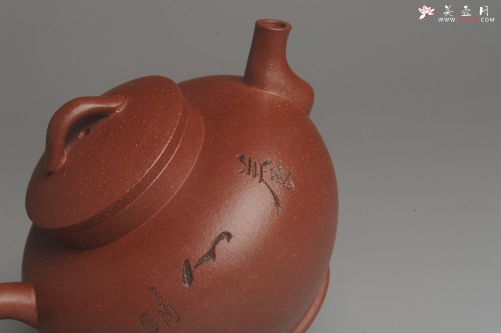 紫砂壶图片：美壶特惠 助工精工降坡泥陶瓮壶 蜗牛特文气 - 宜兴紫砂壶网