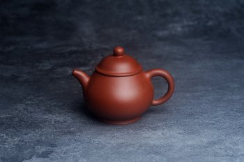 紫砂壶图片：美壶特惠 全手工优质黄龙山红泥刹凹成型单片拍打潘壶 - 宜兴紫砂壶网