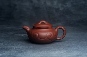 紫砂壶图片：美壶特惠 精致底槽青仿古如意壶 茶人醉爱 - 宜兴紫砂壶网