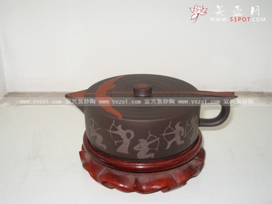 紫砂壶图片：千钧一发（诸葛逸仙，李园林） - 宜兴紫砂壶网