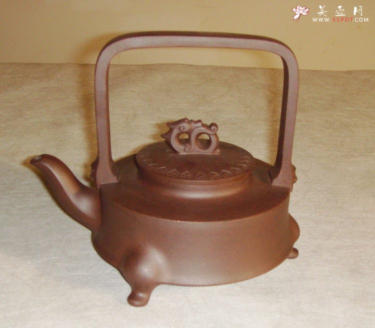 紫砂壶图片：千禧提梁 - 宜兴紫砂壶网