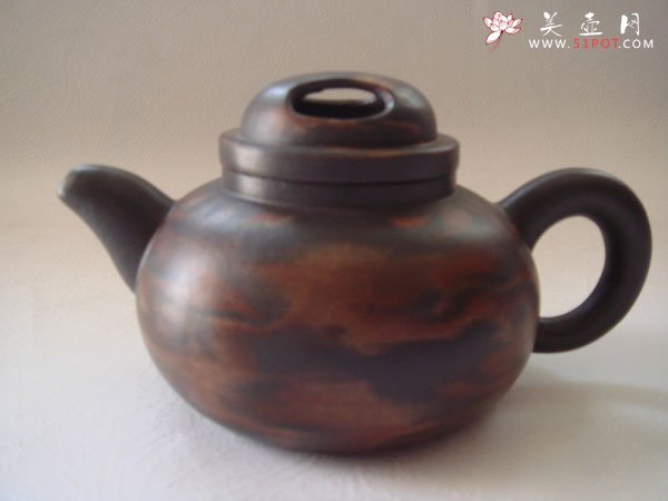 紫砂壶图片：绞泥牛盖 - 宜兴紫砂壶网