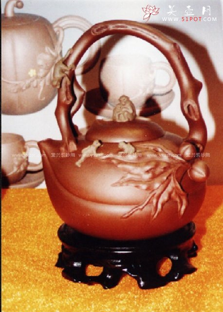 紫砂壶图片：五吼献寿提梁 - 宜兴紫砂壶网