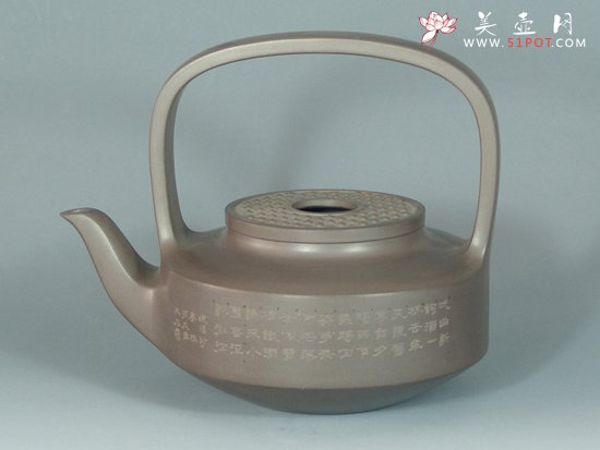 紫砂壶图片：玉璧提梁（木石刻） - 宜兴紫砂壶网