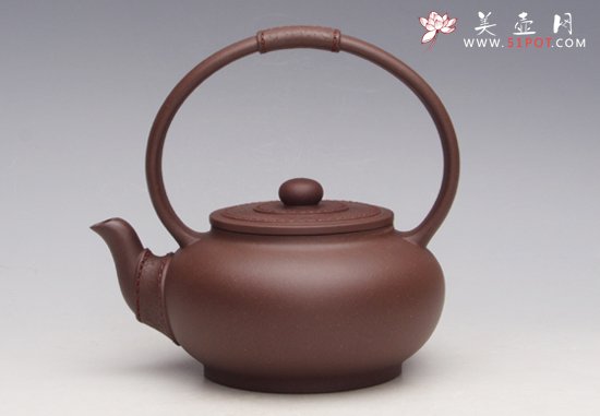 紫砂壶图片：包容提梁壶 - 宜兴紫砂壶网