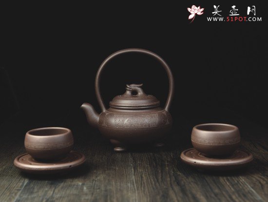 紫砂壶图片：永禄提梁壶 - 宜兴紫砂壶网