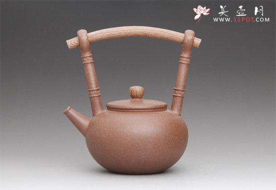 紫砂壶图片：桃木提梁 - 宜兴紫砂壶网
