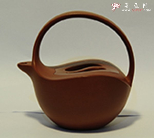 紫砂壶图片：太极提梁 - 宜兴紫砂壶网