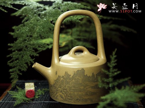 紫砂壶图片：曼生提梁 - 宜兴紫砂壶网